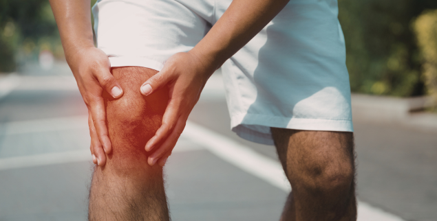 Man suffering from knee pain