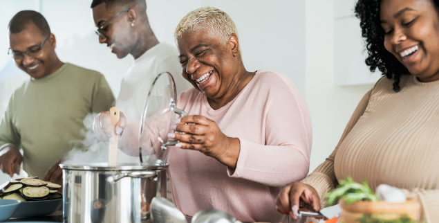 Family cooking a healthy meal together